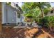 Beautiful backyard featuring a fire pit, comfortable seating, and privacy at 1274 Hampshire Rd, Charleston, SC 29412