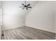 Spacious bedroom with light walls, ceiling fan and vinyl plank flooring at 1274 Hampshire Rd, Charleston, SC 29412