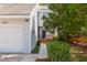 Attractive home exterior with well-maintained landscaping, a one car garage, and a welcoming front porch at 1274 Hampshire Rd, Charleston, SC 29412