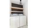 Laundry room featuring a washer, dryer, shelving, and modern light fixture at 1274 Hampshire Rd, Charleston, SC 29412