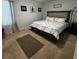 Relaxing bedroom with a bed, bedside table, window and comfortable carpet at 136 Caleb Ct, Ladson, SC 29456