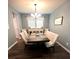 Inviting dining room featuring neutral decor, modern chandelier, and comfortable seating at 136 Caleb Ct, Ladson, SC 29456
