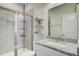 Modern bathroom featuring a glass enclosed shower, granite countertop, and decorative shelving at 136 Rowans Creek Dr, Charleston, SC 29492