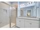 Bathroom with a dual sink vanity, granite countertops, and glass-enclosed shower at 136 Rowans Creek Dr, Charleston, SC 29492