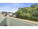 A tranquil exterior view of the community, with lush green trees against a blue sky at 136 Rowans Creek Dr, Charleston, SC 29492
