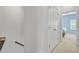 Second-floor hallway with carpeting and doors leading to bedrooms at 136 Rowans Creek Dr, Charleston, SC 29492