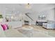Open-concept living room featuring modern decor and wood floors at 136 Rowans Creek Dr, Charleston, SC 29492