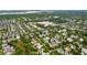 Neighborhood aerial view of a picturesque home surrounded by mature trees at 1407 Wando View St, Daniel Island, SC 29492