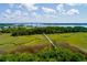 Sweeping aerial view featuring marshland and a bridge in the distance at 1407 Wando View St, Daniel Island, SC 29492