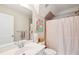 Bathroom with a shower/tub combo, single sink vanity, and neutral decor at 1407 Wando View St, Daniel Island, SC 29492