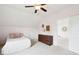 Bedroom featuring a ceiling fan, and doorway to a bedroom with natural lighting at 1407 Wando View St, Daniel Island, SC 29492