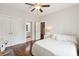 Bedroom with hardwood floors, closet, and en-suite bathroom access at 1407 Wando View St, Daniel Island, SC 29492