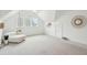Spacious bonus room with a ceiling fan, natural light, and chair swing at 1407 Wando View St, Daniel Island, SC 29492