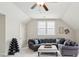 Bonus room offers a comfortable seating area and space for a home gym at 1407 Wando View St, Daniel Island, SC 29492
