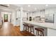 Bright kitchen featuring a large center island with barstool seating and pendant lighting at 1407 Wando View St, Daniel Island, SC 29492