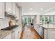 Beautiful kitchen with an open layout to the dining room and access to other living spaces at 1407 Wando View St, Daniel Island, SC 29492