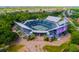 Aerial view of a professional tennis stadium with green seating at 1407 Wando View St, Daniel Island, SC 29492