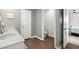 Bathroom featuring a double sink vanity, wood flooring and a water closet at 141 Lagoona Dr, Summerville, SC 29483