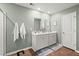 Bathroom features a double sink vanity, white cabinets, and green painted walls at 141 Lagoona Dr, Summerville, SC 29483
