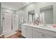 Bathroom features a double sink vanity, walk-in shower and green painted walls at 141 Lagoona Dr, Summerville, SC 29483