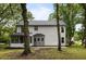 The backyard boasts a screened porch and a charming bump-out, providing a peaceful outdoor space at 1478 Diamond Blvd, Mount Pleasant, SC 29466