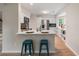 Modern kitchen featuring stainless steel appliances, white cabinetry, and a breakfast bar at 1478 Diamond Blvd, Mount Pleasant, SC 29466