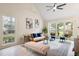 Light filled living room with large windows, plush seating, and contemporary decor at 1478 Diamond Blvd, Mount Pleasant, SC 29466