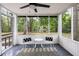 Screened-in porch offering a peaceful outdoor space with views of the surrounding nature at 1478 Diamond Blvd, Mount Pleasant, SC 29466