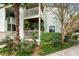 Charming condo with multiple balconies, lush landscaping, and mature trees at 1481 Center Street Extension # 1102, Mount Pleasant, SC 29464