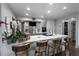 Bright kitchen with a breakfast bar featuring modern countertops and stylish seating at 1481 Center Street Extension # 1102, Mount Pleasant, SC 29464
