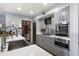 Modern kitchen featuring stainless steel appliances, white countertops and soft grey cabinets at 1481 Center Street Extension # 1102, Mount Pleasant, SC 29464