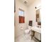 Elegant powder room featuring a marble sink, brass accents, and modern fixtures at 1646 Marsh Harbor Ln, Mount Pleasant, SC 29464