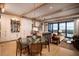 Bright open-concept living and kitchen area with wood beam details and modern furnishings at 1646 Marsh Harbor Ln, Mount Pleasant, SC 29464