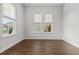 Bright bedroom with hardwood floors and a large window offering natural light at 165 Country Gate Ln, Summerville, SC 29485