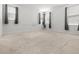 Spacious bedroom with neutral carpet, ample natural light, and minimalist decor at 165 Country Gate Ln, Summerville, SC 29485