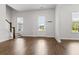 Inviting foyer features hardwood floors, a staircase, and a bright, welcoming entrance at 165 Country Gate Ln, Summerville, SC 29485
