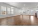 Expansive living room featuring hardwood floors, recessed lighting, and large windows with natural light at 165 Country Gate Ln, Summerville, SC 29485