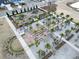 Community playground with green turf, mature palm trees, picnic tables, and other amenities at 165 Country Gate Ln, Summerville, SC 29485