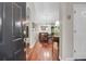 Inviting foyer boasts gleaming hardwood floors and an arched entryway to the dining area at 169 Historic Dr, Mount Pleasant, SC 29464