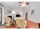 Bright living room showcasing fireplace, hardwood flooring, and comfortable seating at 169 Historic Dr, Mount Pleasant, SC 29464