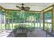 Screened patio with outdoor seating and ceiling fan at 169 Historic Dr, Mount Pleasant, SC 29464