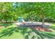 This colorful community playground features swings, slides, and a variety of climbing structures for enjoyment at 169 Historic Dr, Mount Pleasant, SC 29464