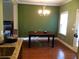 Dining room with hardwood floors, chandelier, and natural light; perfect for meals at 1720 Restoration Ct, Charleston, SC 29414