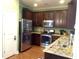 Updated kitchen with stainless steel appliances, granite counters, and ample cabinet space at 1720 Restoration Ct, Charleston, SC 29414