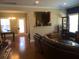 Spacious living room with hardwood floors, open to the kitchen for seamless entertaining at 1720 Restoration Ct, Charleston, SC 29414