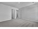 Carpeted bedroom with neutral walls, recessed lighting, and two doorways at 179 Threaded Fern St, Summerville, SC 29485