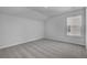 Bedroom with a window and neutral carpet at 179 Threaded Fern St, Summerville, SC 29485