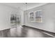 Bright dining area with sliding glass doors offers easy access to the patio and a charming pendant light fixture at 179 Threaded Fern St, Summerville, SC 29485