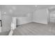 Open loft area with neutral carpet and lots of natural light at 179 Threaded Fern St, Summerville, SC 29485