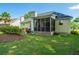 Well-maintained backyard featuring a screened porch at 181 Sea Cotton Cir, Charleston, SC 29412
